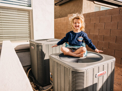 Little Girl Staying Cool in Arizona Summer With AC Installation in Mesa, AZ